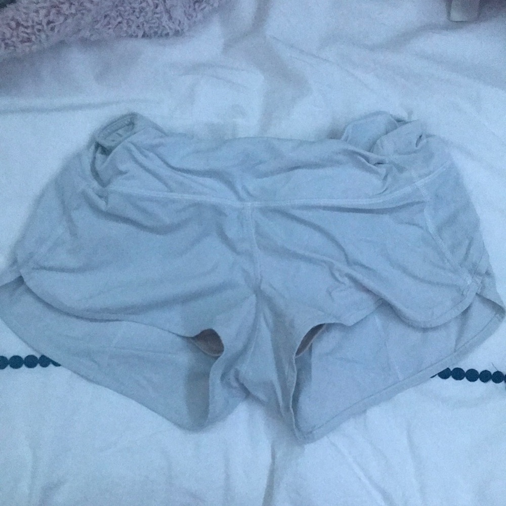White lululemon speed up shorts.